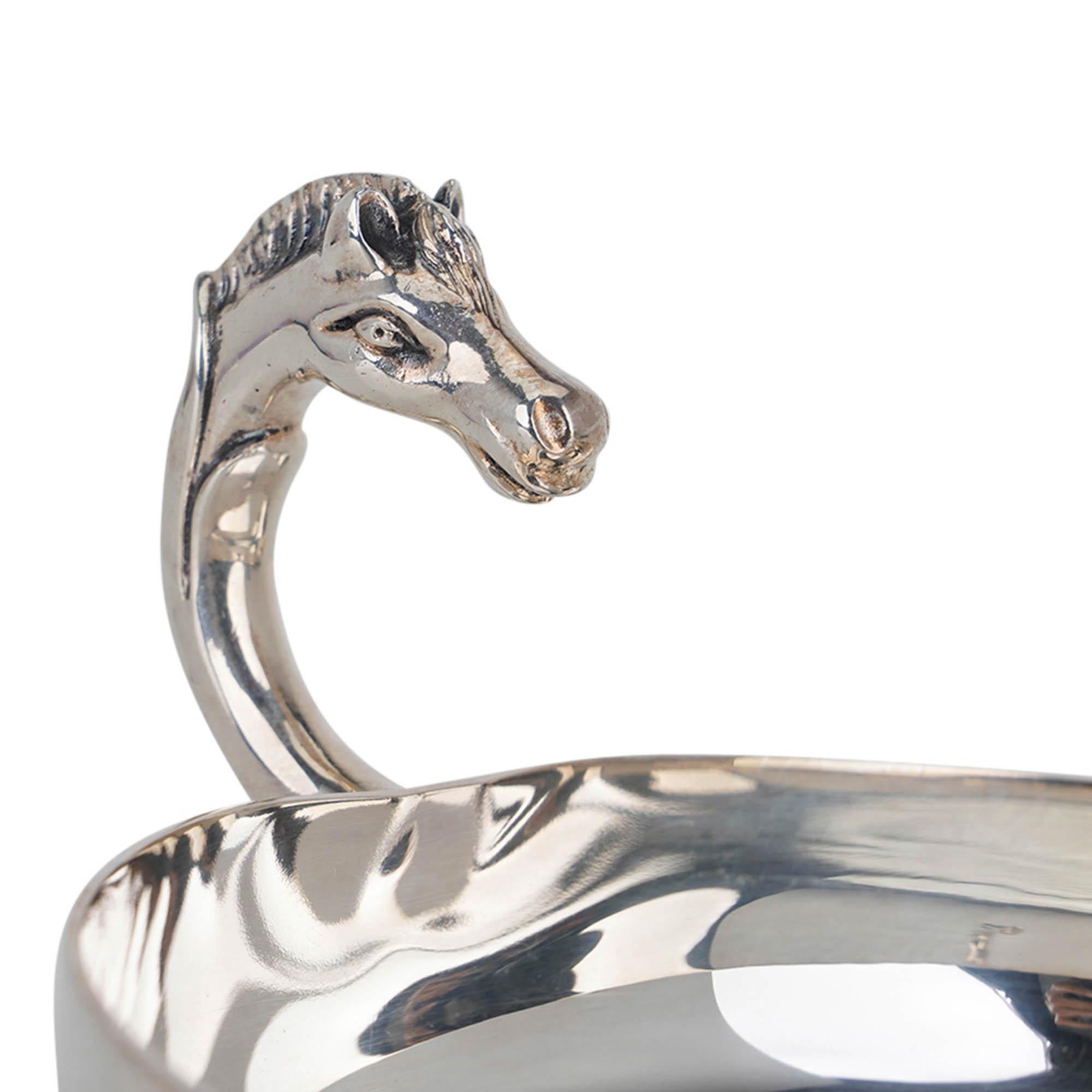 Mightychic offers an Hermes Vintage Catch All Pin tray.
Designed by Ravinet D'Enfert.
Silver plated round tray with horse head handle.
Stamped Hermes Paris Made in France. D'Enfert mark.
Wonderful for desk or gifting.
Tray has some light naturel