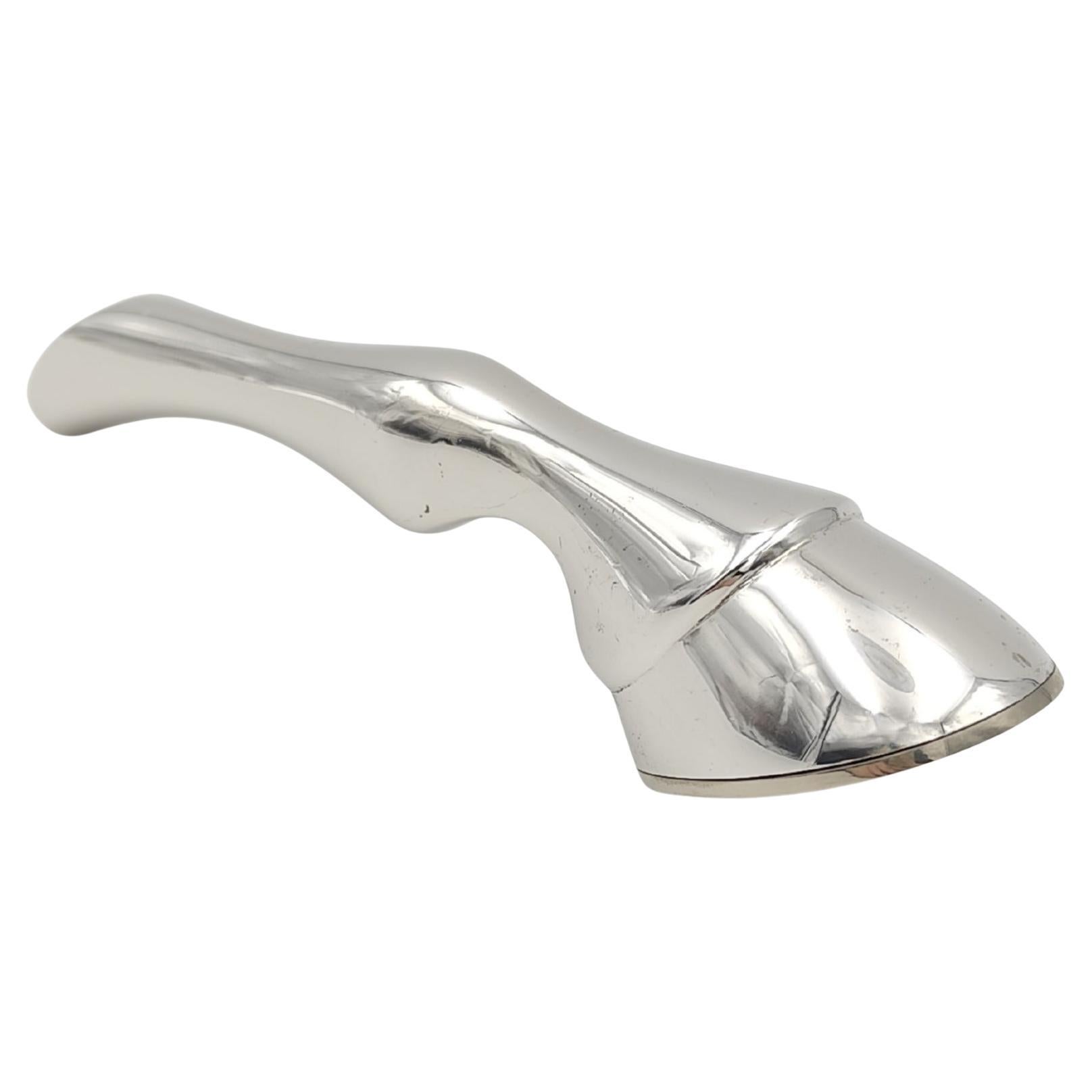 Hermès silver metal horse leg bottle opener
