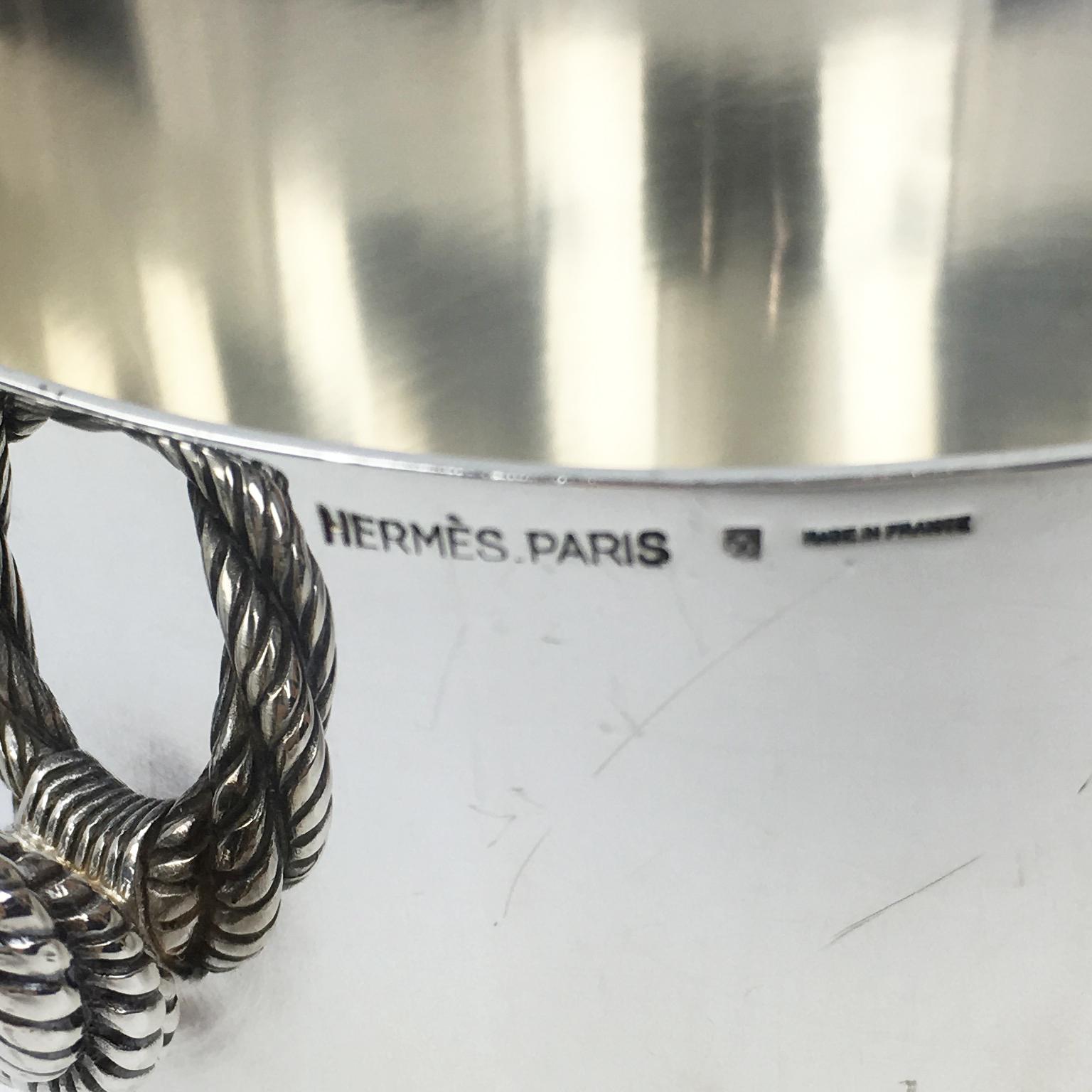 High-end quality nautical-inspired twisted rope handles on that Hermes silver plate ice bucket or half wine bottle cooler. Marked 