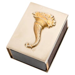 Caja de cerillas metálica «Cornucopia» de Hermes en tono plateado