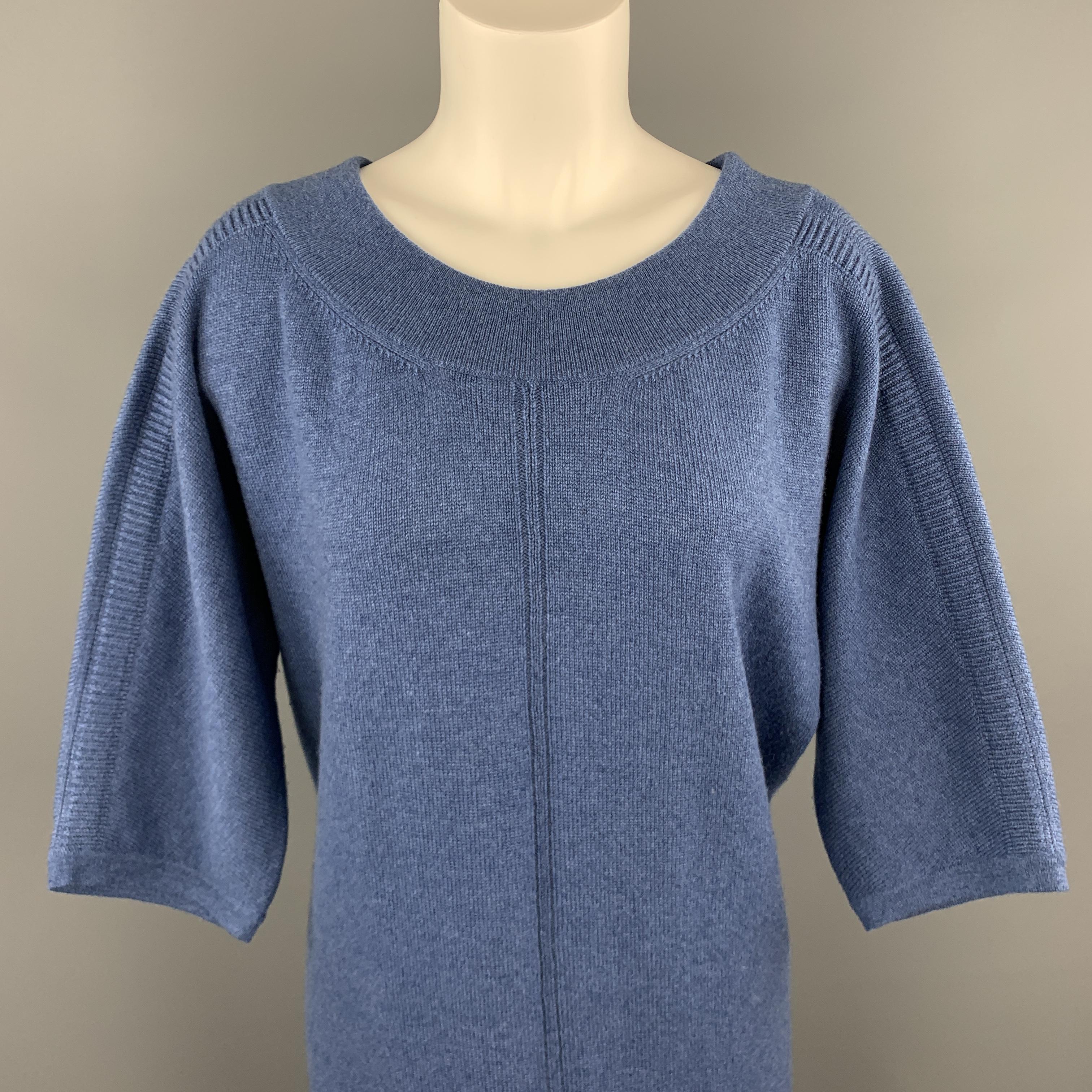 HERMES sweater comes in sky blue cashmere knit with a scoop neck, cropped sleeves, and oversized longline silhouette. Made in UK.

Excellent Pre-Owned Condition.
Marked: EU 38

Measurements:

Shoulder: 18 in.
Bust: 46 in.
Waist: 44 in.
Sleeve: 14