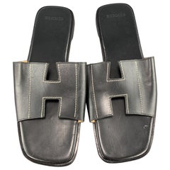 HERMES Size 9 Black Contrast Stitch Leather Slip On H Strap Sandals