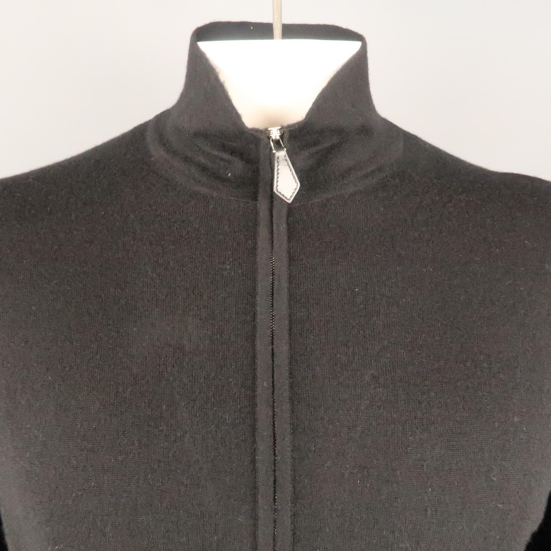 HERMES pullover comes in a black cashmere and silk featuring a half zip closure. Made in Italy.
 
Very Good Pre-Owned Condition.
Marked:
 
Measurements:
 
Shoulder: 21 in.
Chest: 46 in.
Sleeve: 30 in.
Length: 28.5 in.