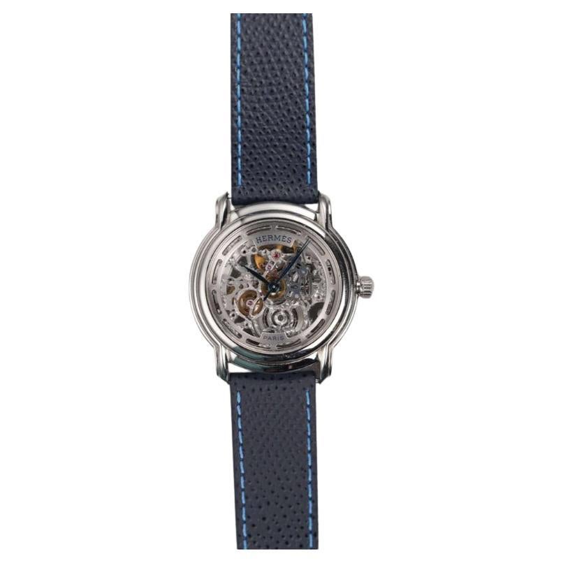 Reloj Hermes Esqueleto en caja de acero inoxidable, años 2000
