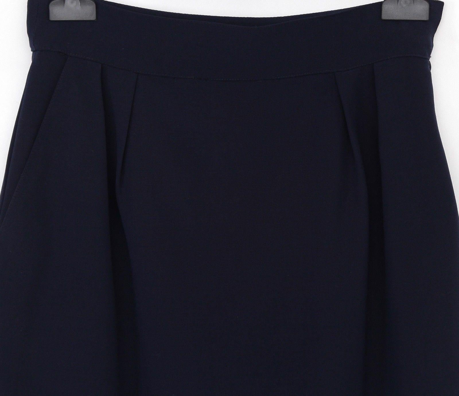 GUARANTEED AUTHENTIC HERMES VINTAGE NAVY BLUE WOOL STRAIGHT SKIRT



Details:
• Classic light weight wool straight fitted skirt in a navy blue color.
• Front pleating.
• Size zipper with dual hook-n-eye closure.
• Fully signature lining.
Fabric: