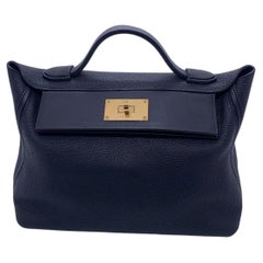 Hermes Small 24/24 Black Leather, Gold Hardware, C Stamp