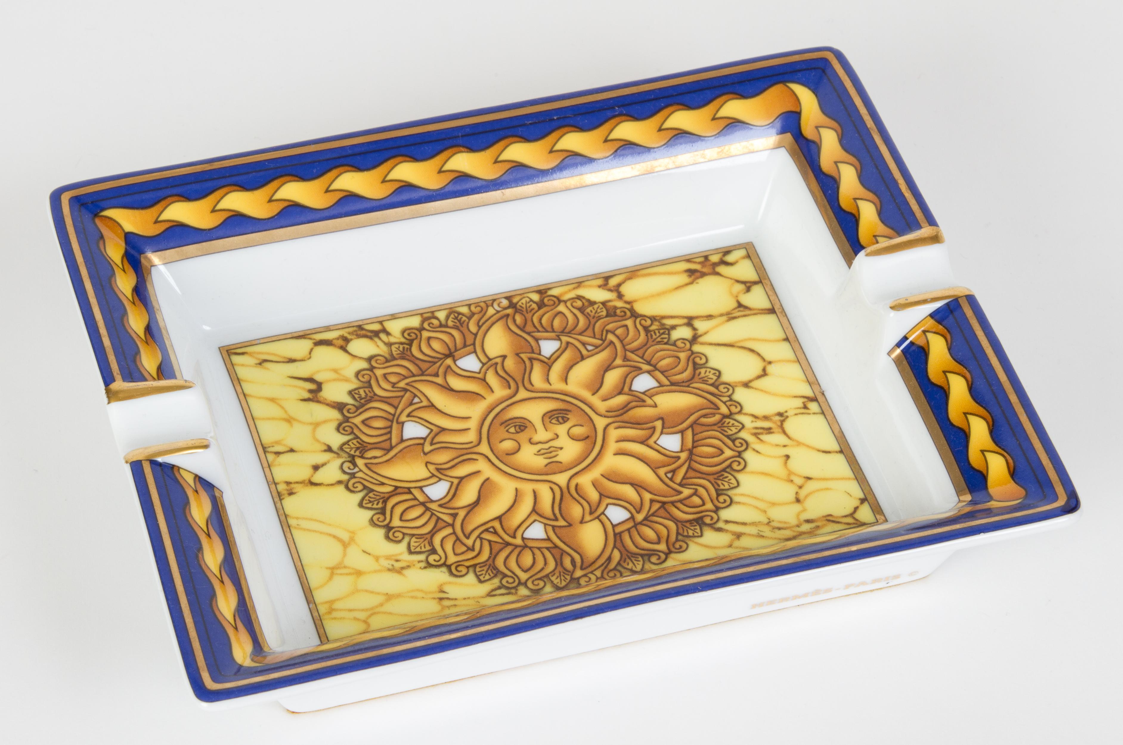 Hermès rectangular soleil design porcelain ashtray. Excellent condition.