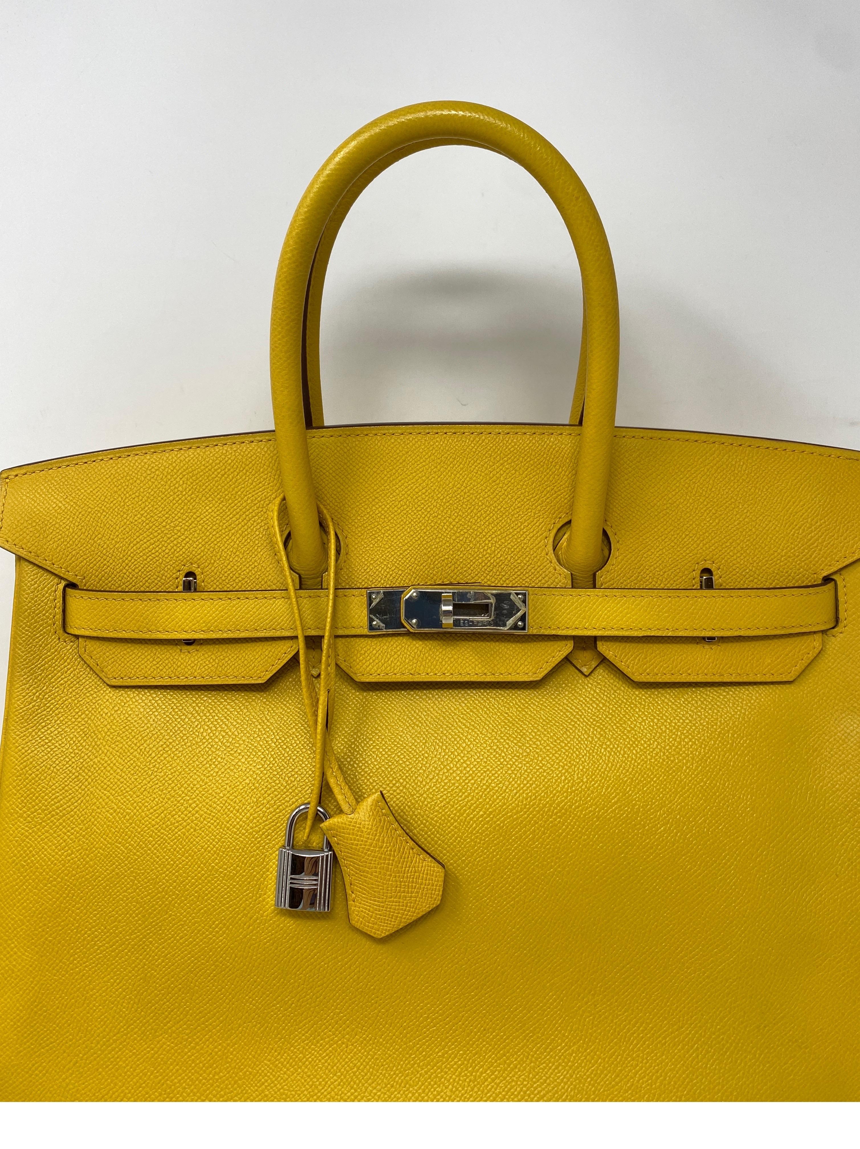 Hermes Soleil Yellow Birkin 35 Bag. Bright sun yellow color. Palladium silver hardware. Good condition. Nice structure epsom leather bag. Hard to find yellow Birkin. Includes clochette, lock, keys, and dust bag. Guaranteed authentic. 