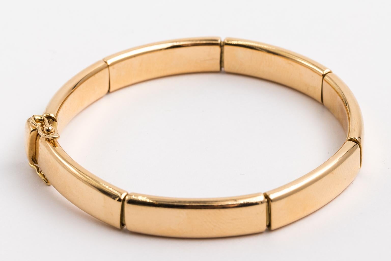 Women's Hermes Solid 18 Karat Yellow Gold Flex Bangle Bracelet For Sale