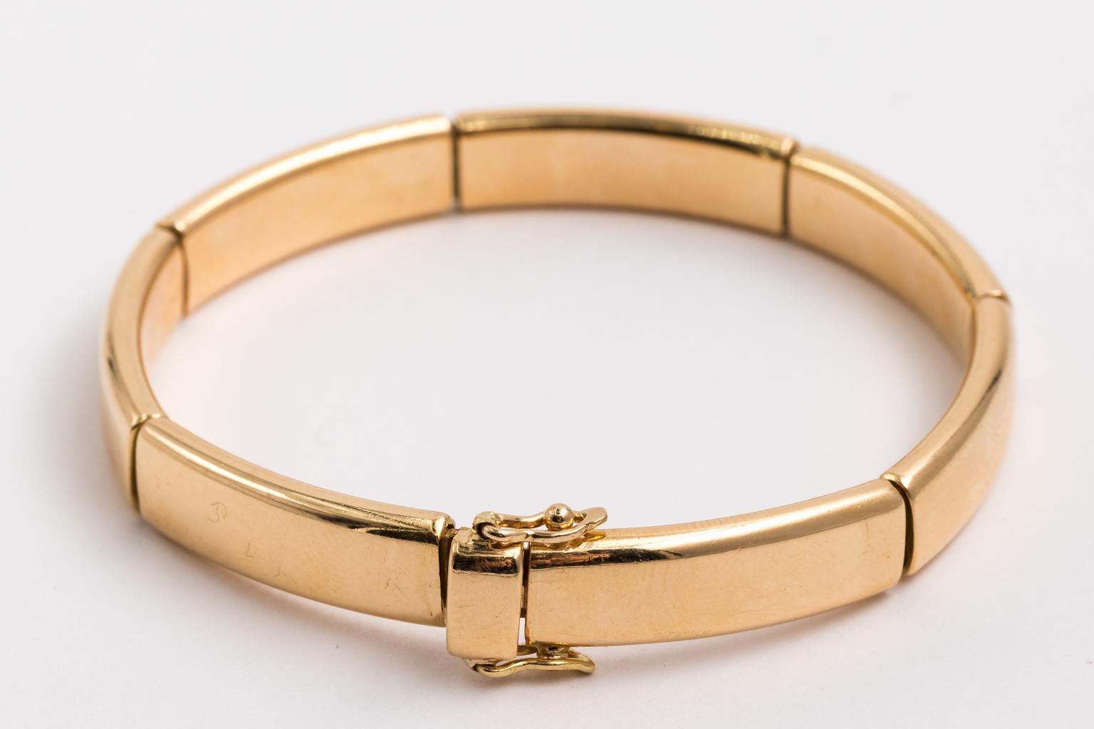 Hermes Solid 18 Karat Yellow Gold Flex Bangle Bracelet For Sale 1