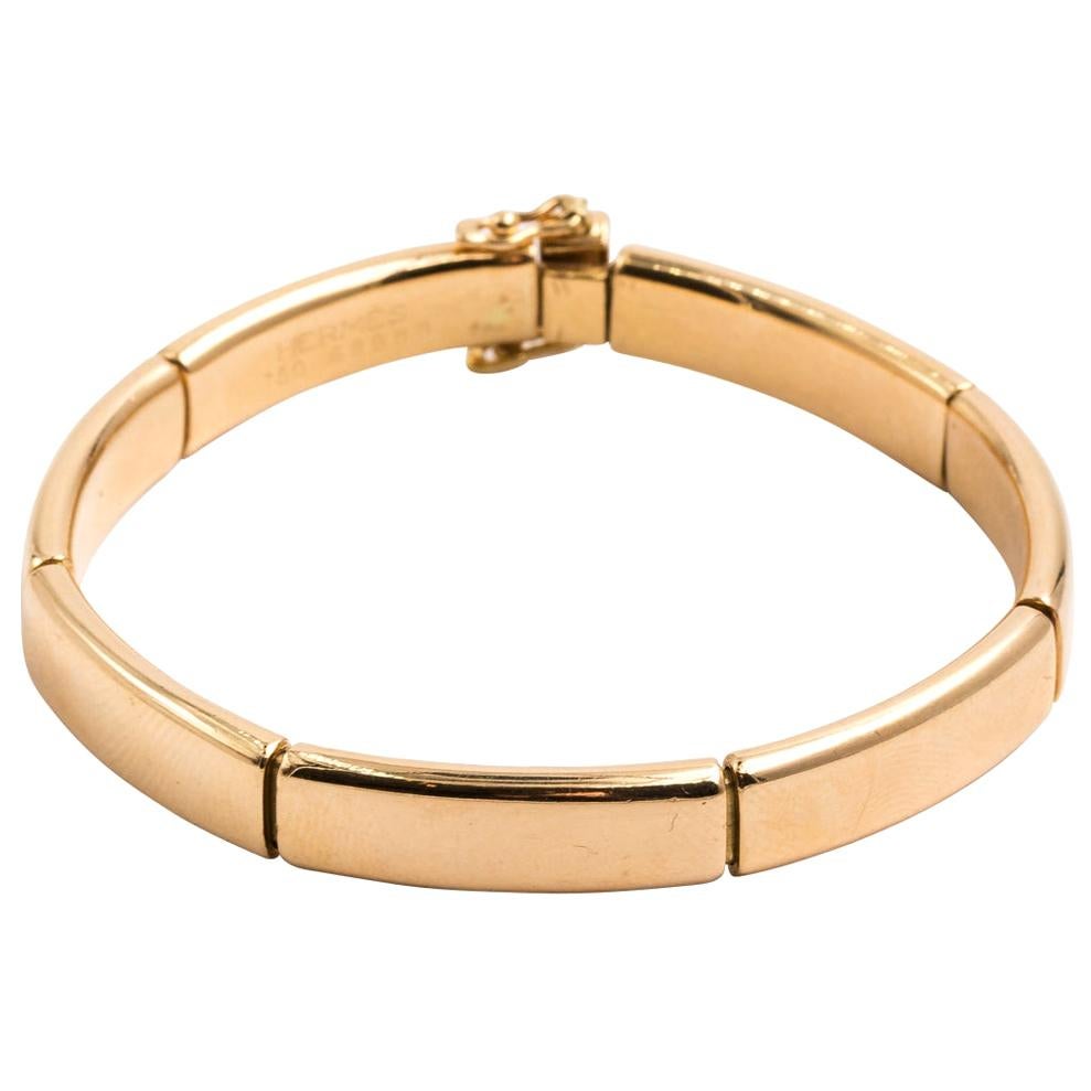 Hermes Solid 18 Karat Yellow Gold Flex Bangle Bracelet For Sale