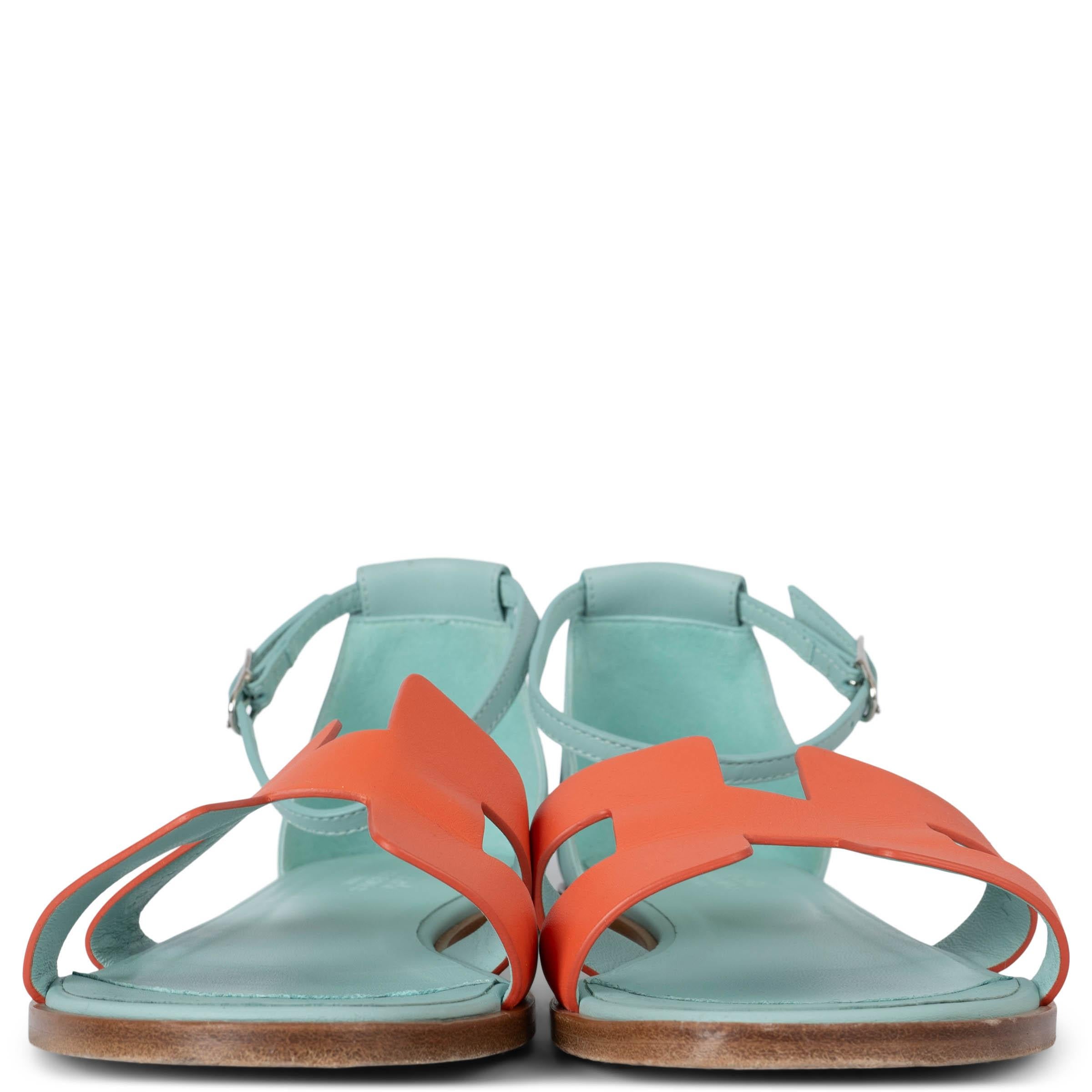 100% authentic Hermès Santorini Ankle-Strap sandals in coral and light blue swift leather. Have been worn and are in excellent condition. 

Measurements
Model	H231228Z 3L400
Imprinted Size	38
Shoe Size	38
Inside Sole	25cm (9.8in)
Width	8cm