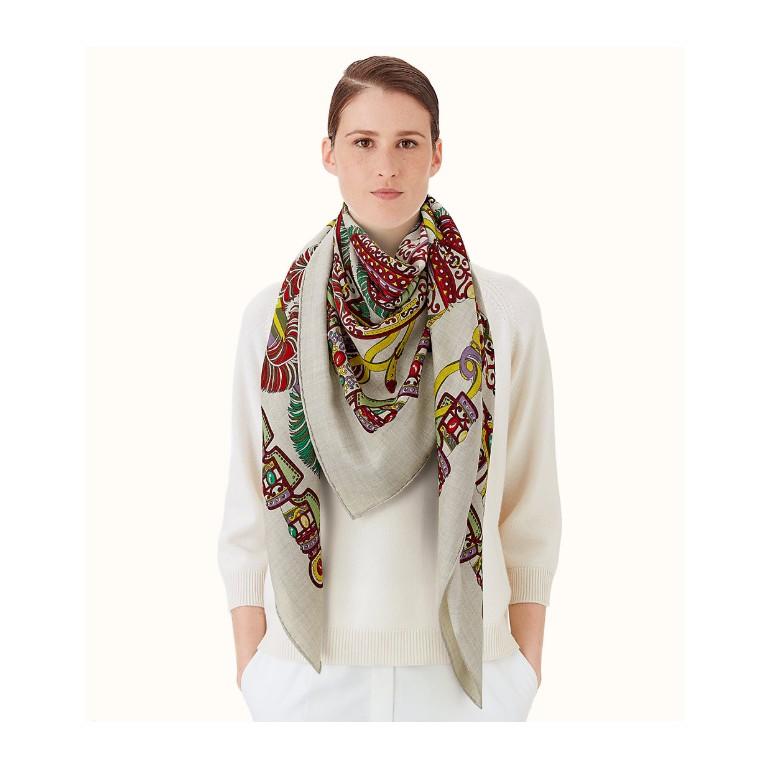 Hermes Grey & Burgundy Sous l'Egide de Mars Shawl 140

- Made of a luxurious silk and cashmere blend
- Gorgeous print designed by Pierre Marie, depicting pieces of armory, jewels and feathers 
- Chevron texture 
- Hand rolled hems 
- Beautiful
