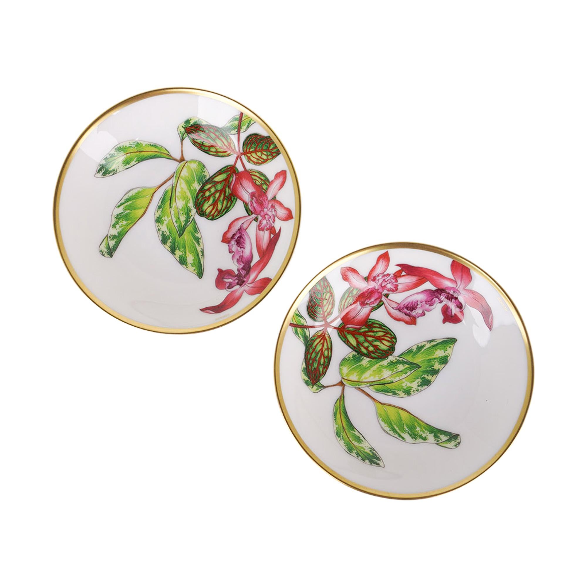 Mightychic offers an  Hermes Soy Dish / Sushi Plate featured in the classic Hermes Passifolia pattern.
A beautiful hommage to the peace and power of flora.
Decorated using Chromolithography.
Hand-painted 24K gold trim.
(Please note: total of 4 bowls