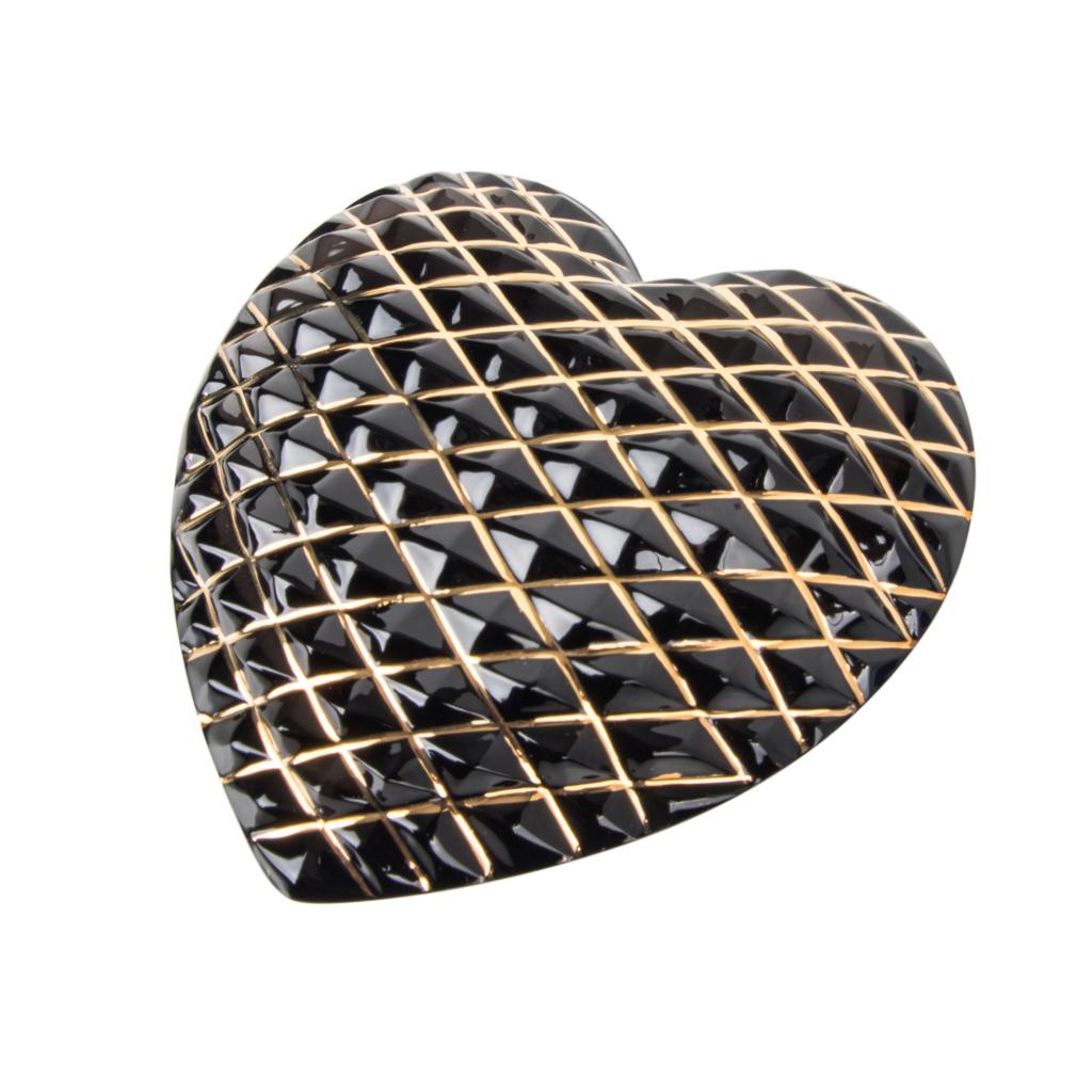 Guaranteed authentic Hermes Saint-Louis Crystal special edition heart shaped paperweight.
Cristallerie de Saint Louis is now part of Hermès  (since 1989).
This exquisite smokey Grey crystal paperweight has hand applied 24k gold. Saint-Louis in