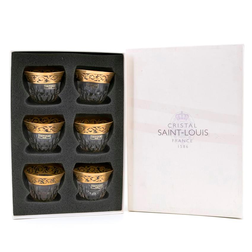 Hermes St. Louis Thistle gold tea/shot glasses. 

Set of six mini tea cups with hand-painted gold detailing. 

Condition - 10/10 

Approx. 

Diameter: 4.8 cm

Height: 4.3 cm