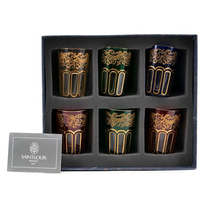 Hermes St. Louis Thistle Regular Decor cups. 

Set of six crystal glasses (two green, two red, one blue, and one clear) with hand-painted gold accents. 

Condition - 10/10

Approx. 

Height: 10 cm

Diameter: 7 cm