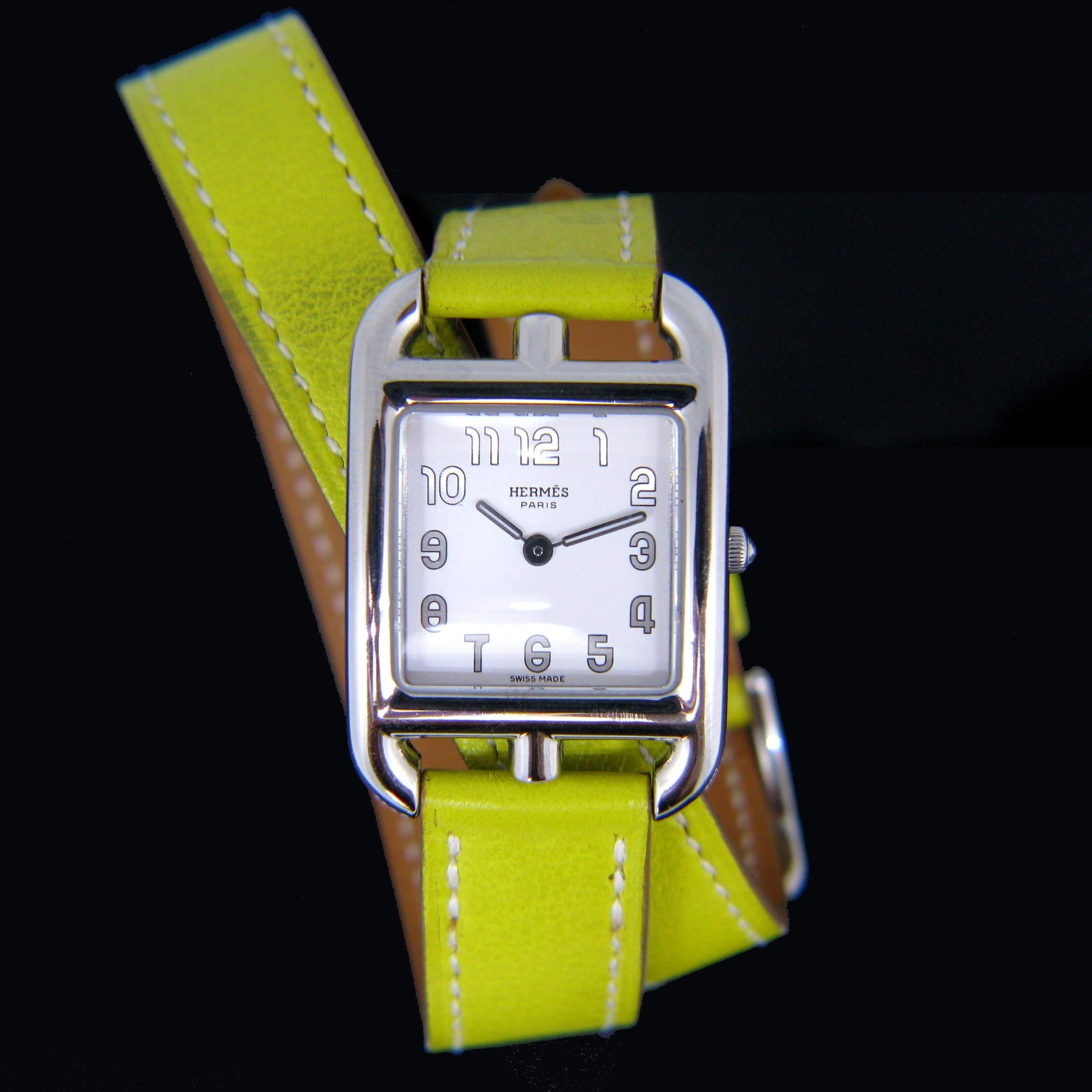 This Hermes watch is from the Cape Cod collection – model reference is CC1.210. The case is square and made in stainless steel. It is numbered 2923274 on the back. The movement is automatic. It is in very good condition. The bracelet is a double