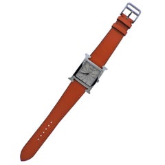 Hermès Stainless Steel H Hour Orange Band quartz Wristwatch Ref HH1.810