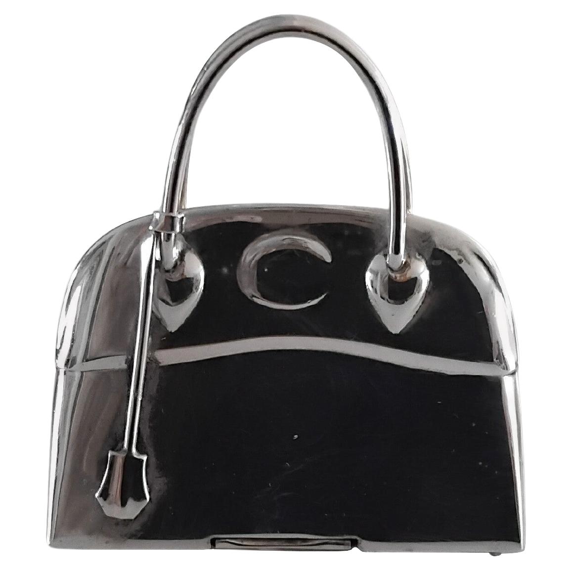 Grazioso e simpatico portapillole autentico Hermès

A forma di borsa 