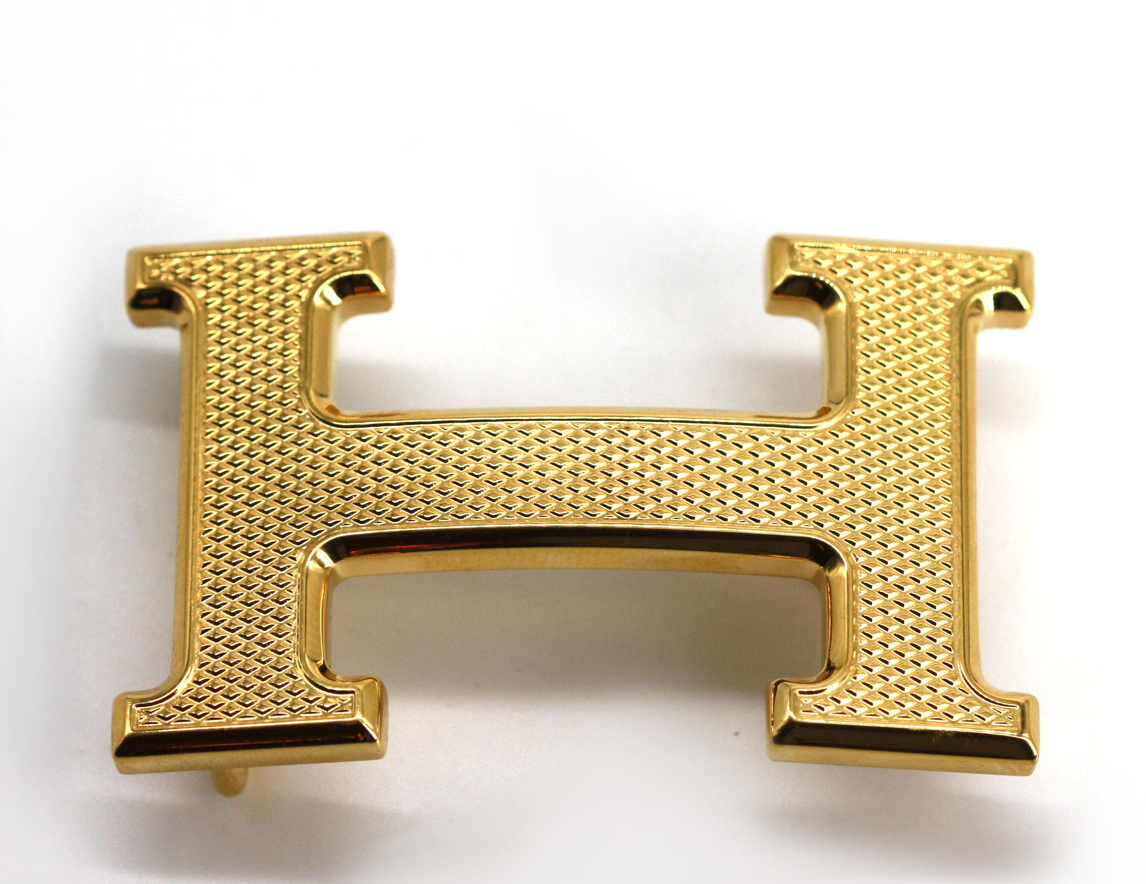 
Hermes Stippled Gold-Toned Metal Belt Buckle
Textured finish, new with dust bag and box.
Height 1.5 in., 4 cm., Width 2.5 in., 6 cm.
Condition Report
New.

