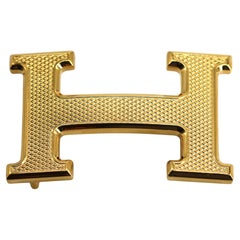 Hebilla de cinturón Hermes de metal dorado punteado