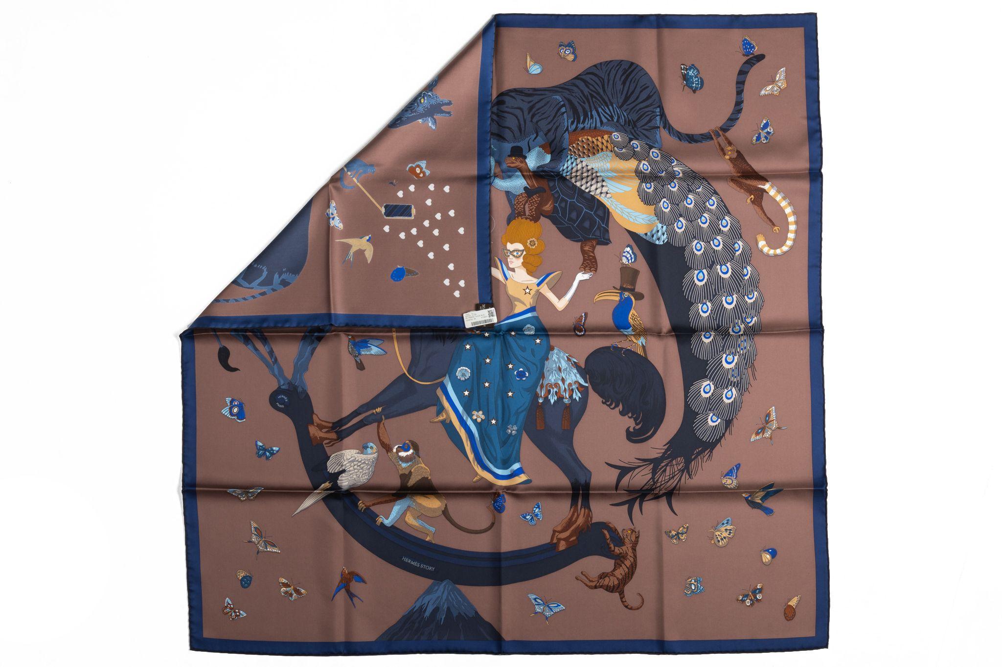 Hermès Story brand new chocolate and blue silk scarf. Hand rolled edges. Comes with original box.