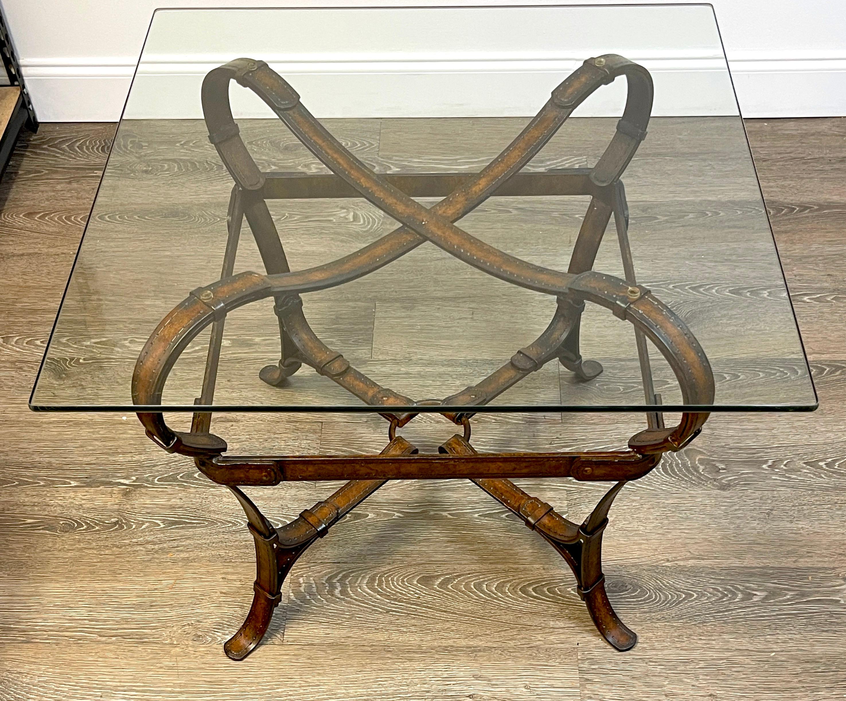 Hermes style Equestrian sculptural forged & polychromed iron side table.
France, circa 1980s.

A rare and unique modern side table in the style of Hermes. Crafted of polychromed forged iron base of sculptural leather straps and horse bits, with