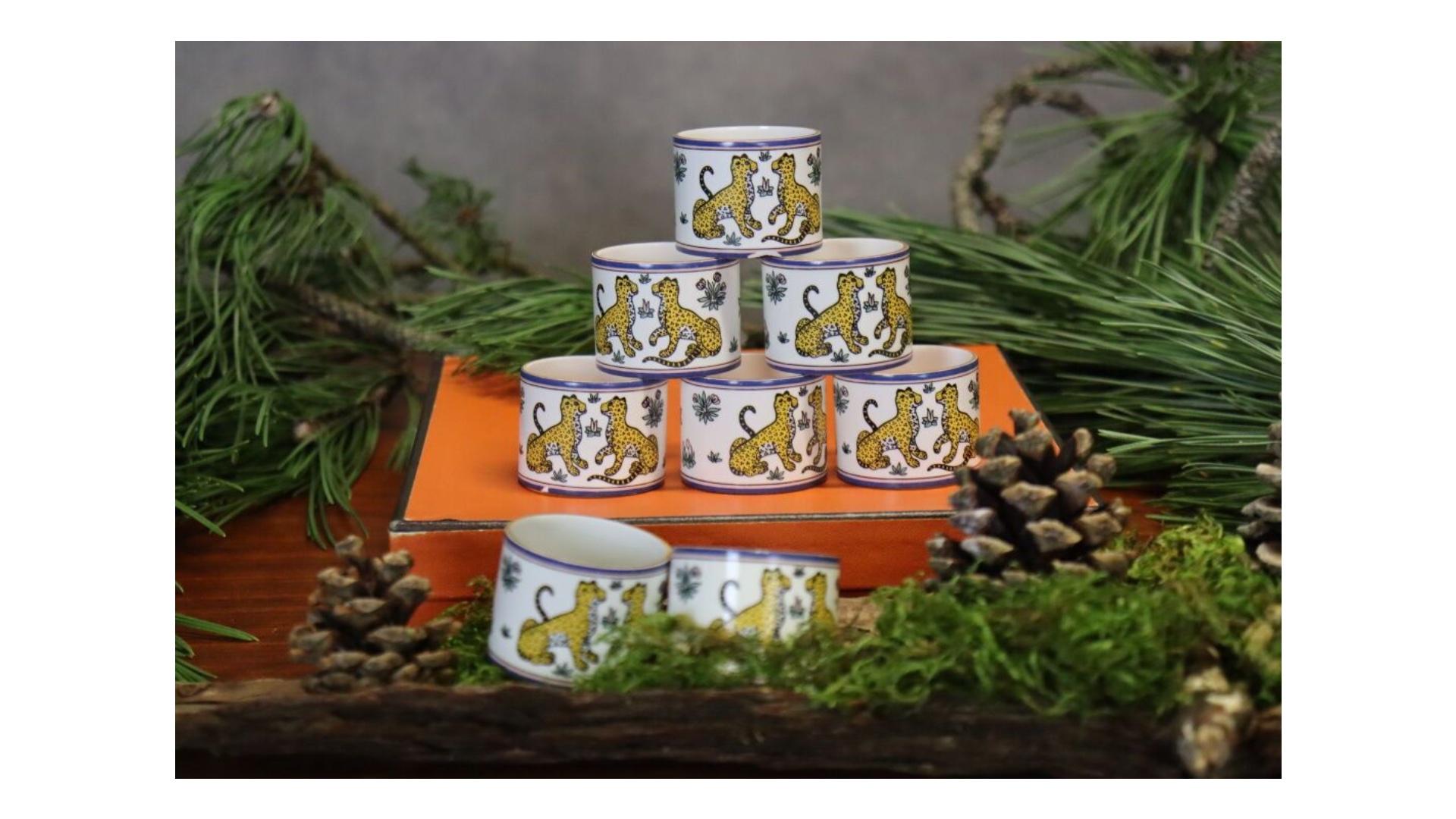 HERMES. HERMES. Suite of 8 napkin rings in enamel with panther decoration. Measures: Diameter : 4 cm. purchase.