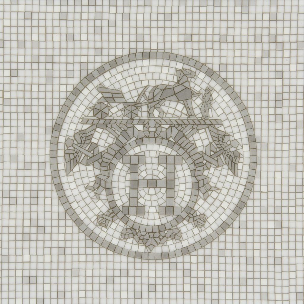 Guaranteed authentic Hermes marvelous sushi plate also used as a small decorative tray.
Limoges Porcelain in platinum and gray mosaic print pays tribute to the iconic mosaic floor of the historic Hermes Faubourg Saint Honore store.
A perfect accent