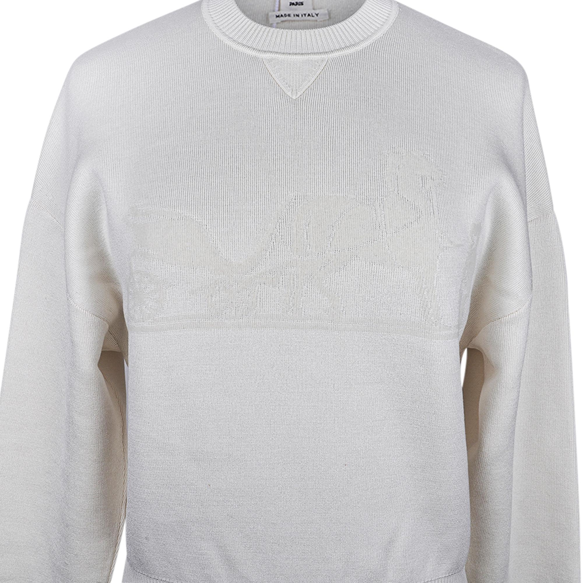 Mightychic offers an Hermes Ex-Libris sweater featured in Winter White.
Slight drop shoulder, crewneck wool knit in a flattering shade of Winter White.
The iconic Ex-Libris subtly woven in.
No longer produced, this fabulous piece is a great