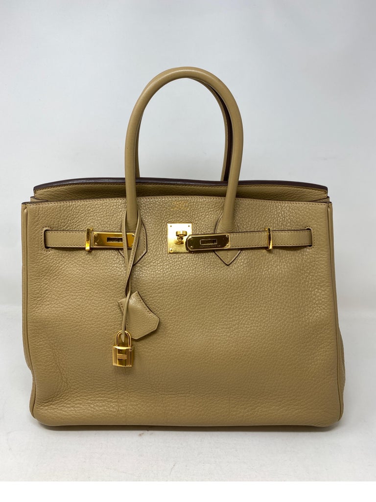 Hermes Birkin Tabac Tan 35 Bag. Good condition. Great neutral color. Most desired gold hardware. Clemence leather. Includes clochette, lock, keys, and dust cover. Guaranteed authentic. 