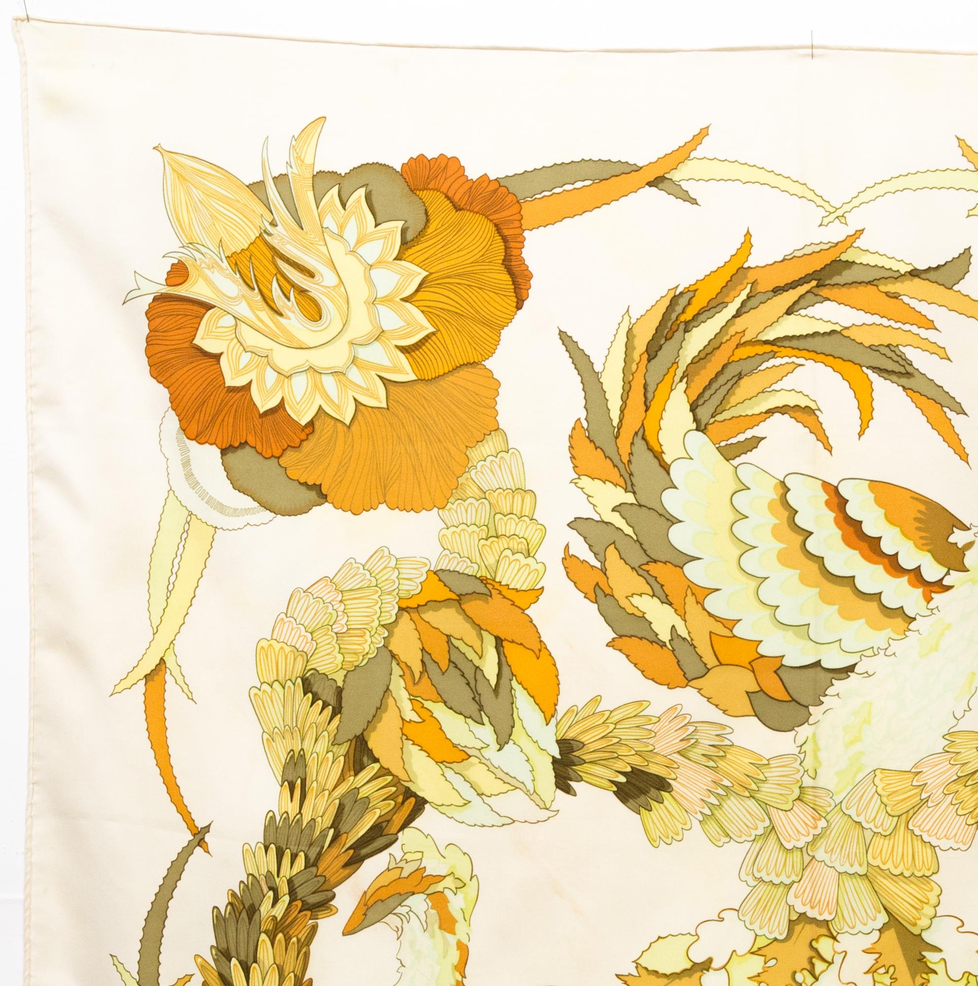 Hermes silk scarf Tahiti by Cathy Latham featuring a ivory border and a Hermès signature. 
Circa 1971 
In good vintage condition. Made in France.
35,4in. (90cm)  X 35,4in. (90cm)
We guarantee you will receive this  iconic item as described and
