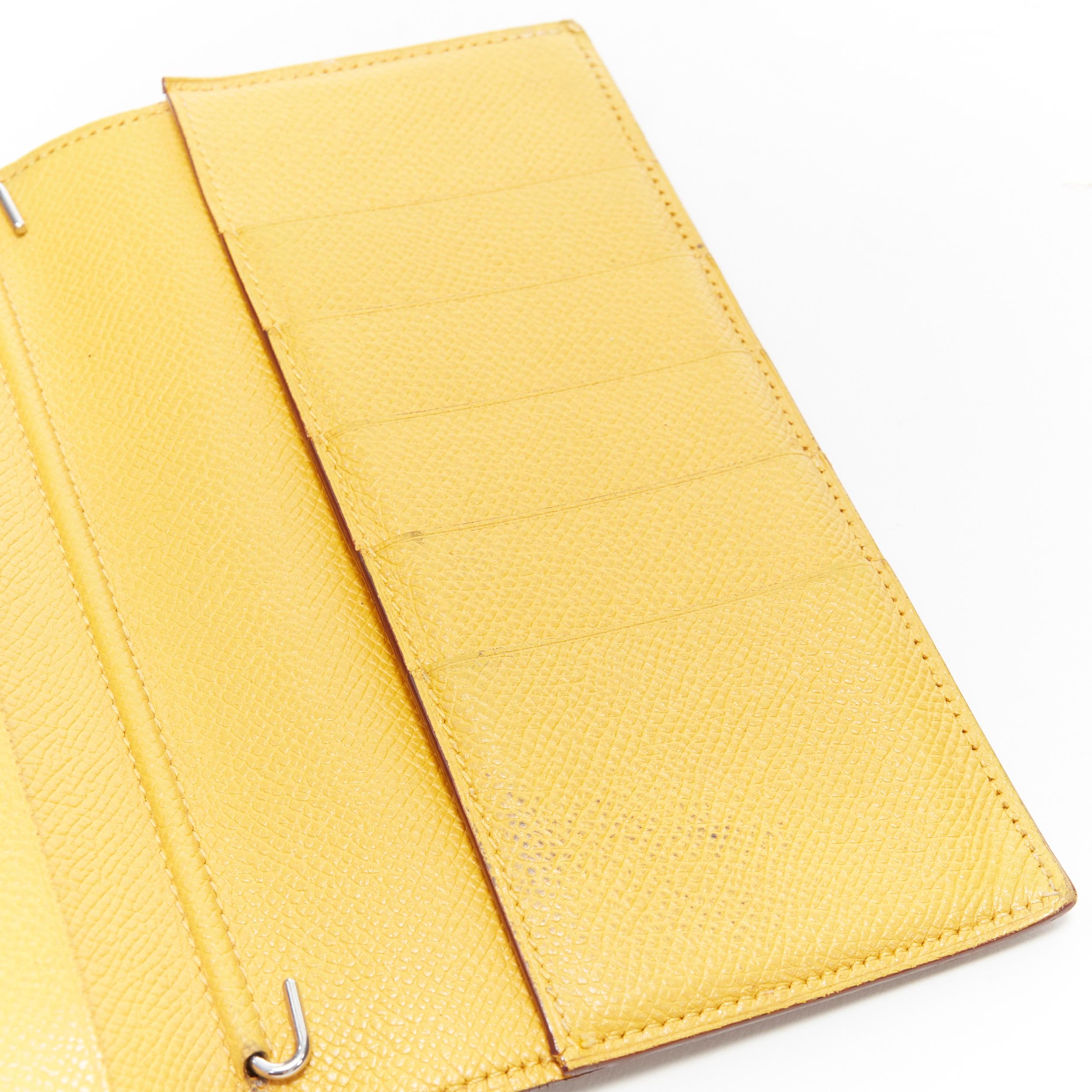 Women's or Men's HERMES tan leather contrast yellow lining minimal long bi fold wallet