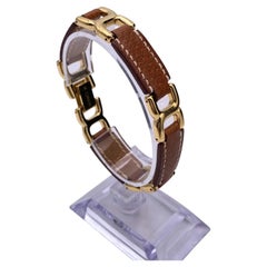 Hermes Tan Leather Gold Metal Place Beauvau Articulated Bracelet