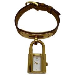 Hermes Tan Leder Kelly Uhr mit Gold Hardware:: 1994.