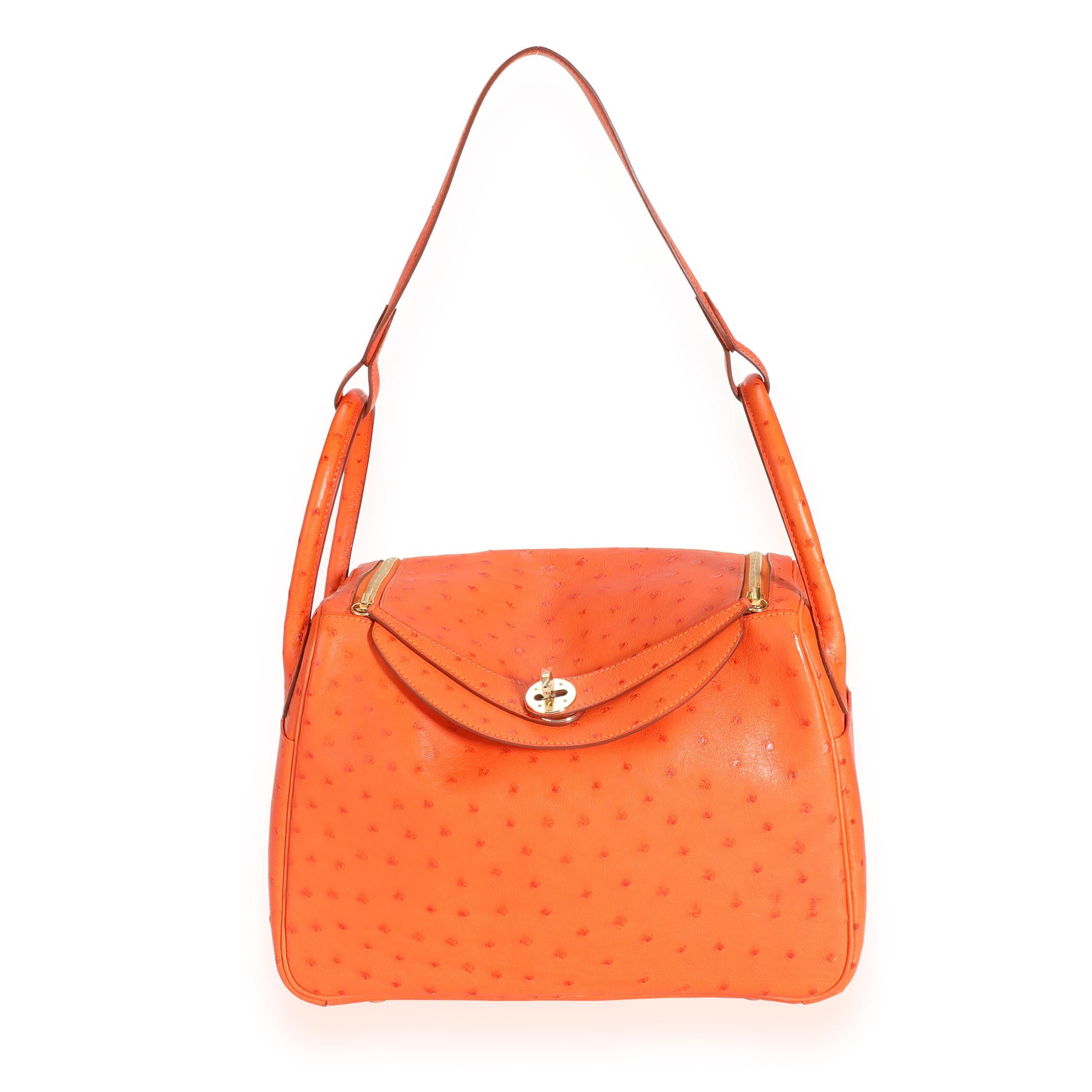 Hermès Tangerine Ostrich Lindy 30 GHW
SKU: 111418
MSRP:  
Condition: Pre-owned (3000)
Condition Description: 
Handbag Condition: Mint
Condition Comments: Mint Condition. Plastic on hardware. No visible signs of wear. Final sale. Please note: this