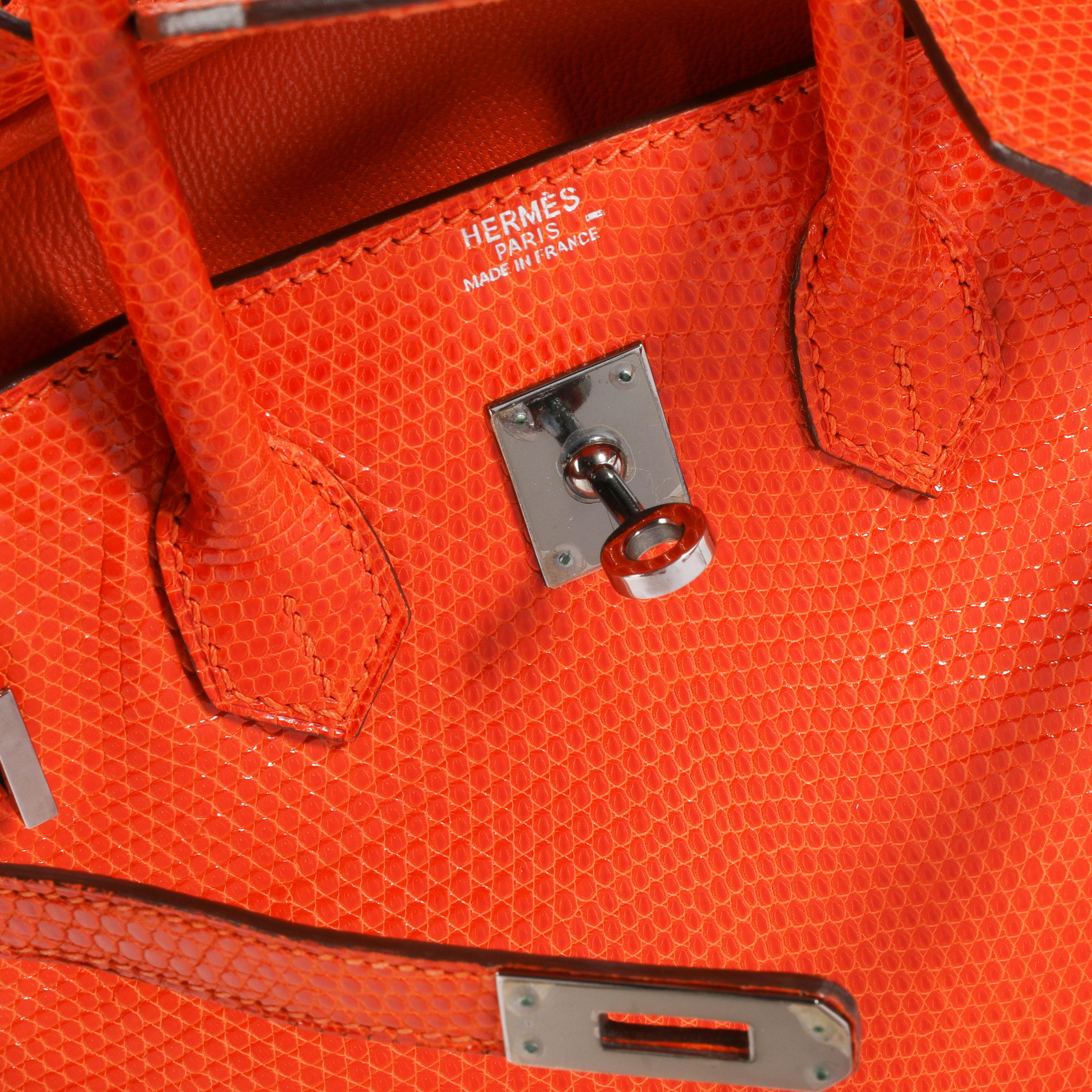 Hermès Tangerine Shiny Lizard Birkin 25 PHW
SKU: 110764

Handbag Condition: Very Good
Condition Comments: Very Good Condition. Plastic on most hardware. Faint marks to interior.
Brand: Hermès
Model: Birkin

Origin Country: France
Handbag Silhouette: