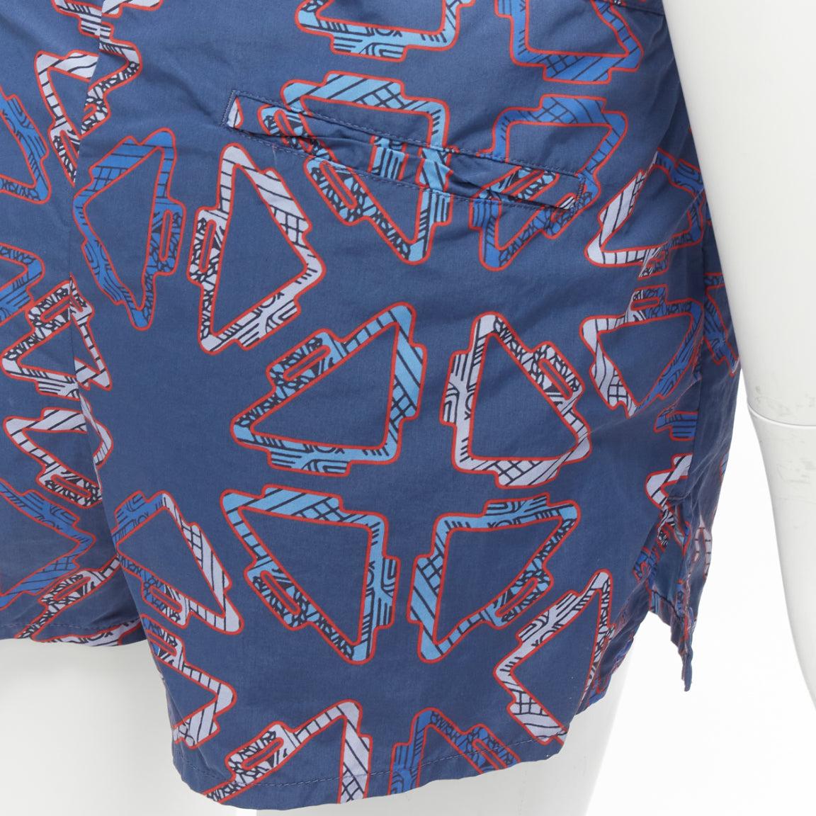 HERMES Tatersales red geometric print drawstring swimming shorts FR38 M
Reference: KYCG/A00053
Brand: Hermes
Model: Tatersales
Material: Polyamide
Color: Navy
Pattern: Geometric
Closure: Drawstring
Extra Details: Beach shorts in 