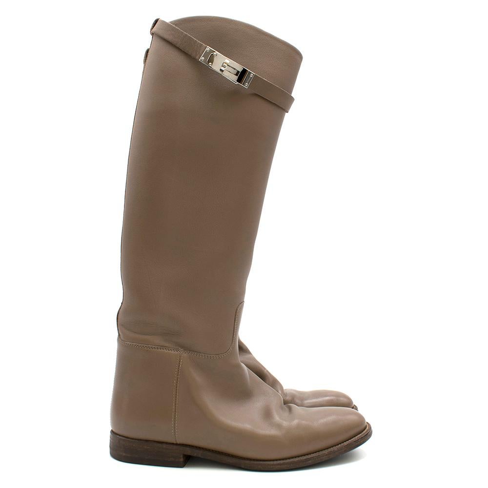 Hermes Grey Variation Riding Boots

Hermes Jumping Boots'
knee-high boots
Round toes
Palladium hardware,
Tonal stitching throughout
Stacked heels 
Kelly straps featuring turn-lock closures at upper
Dust bag included 

Please note, these items are