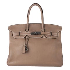 Hermès - Sac Brikin en cuir taupe