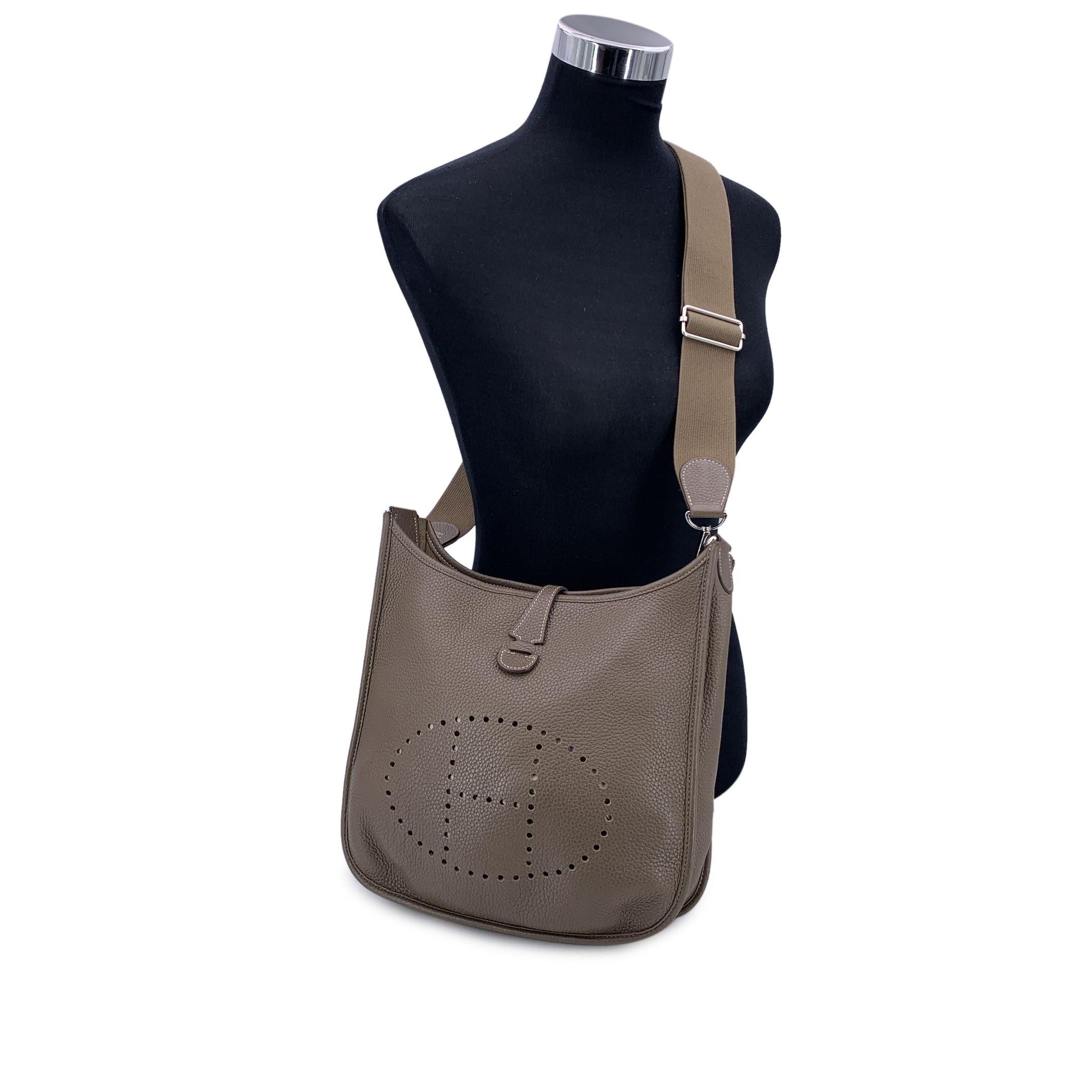 This beautiful Bag will come with a Certificate of Authenticity provided by Entrupy. The certificate will be provided at no further cost. Introducing the timeless elegance of the Hermes 'Evelyne III 29' shoulder bag, crafted in sumptuous Taupe