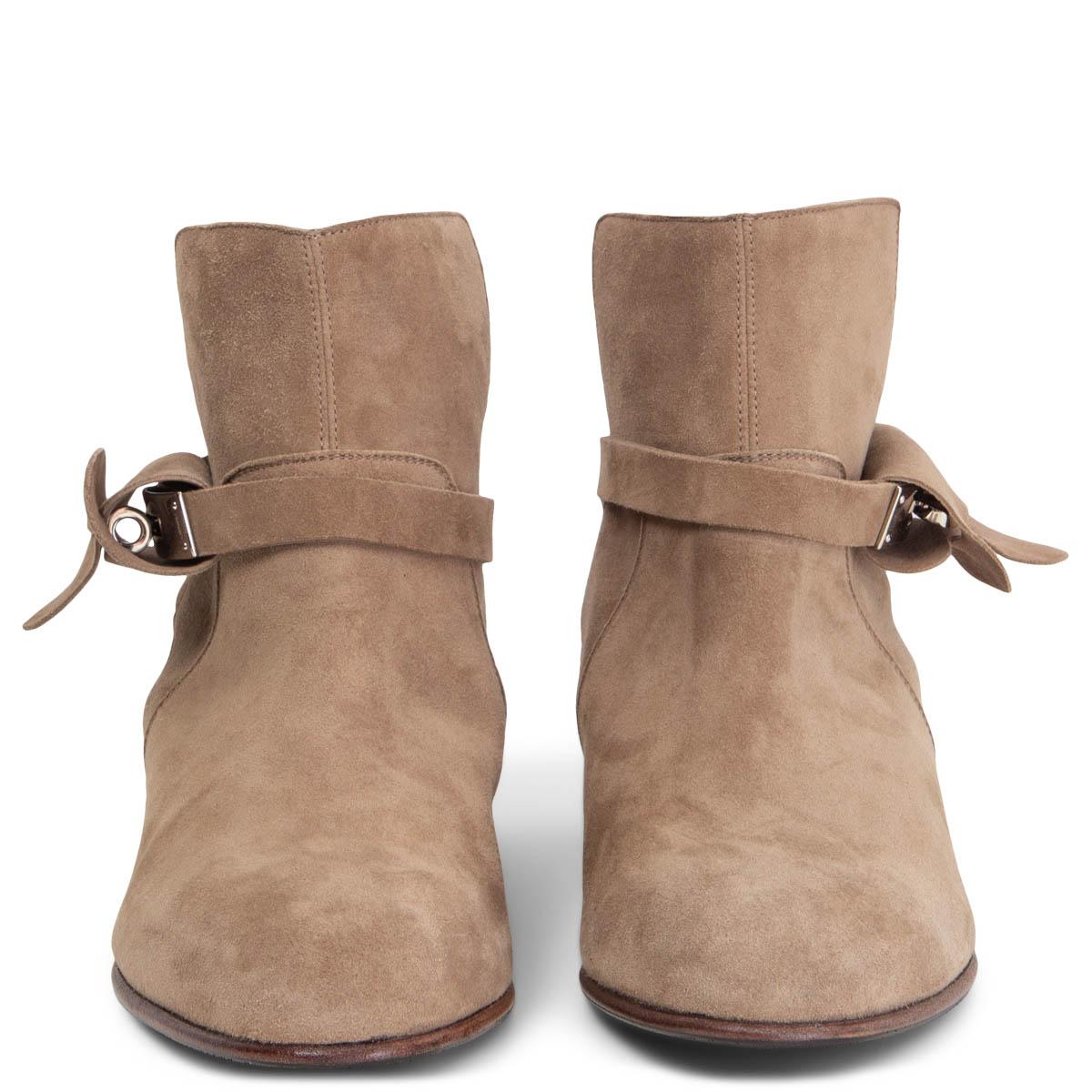 100% authentic Hermès Neo ankle boot in taupe suede leather with iconic Palladium buckle and wrap-around ankle strap. Brand new. Rubber sole has been added. Come with dust bag. 

Measurements
Imprinted Size	39
Shoe Size	39
Inside Sole	26cm