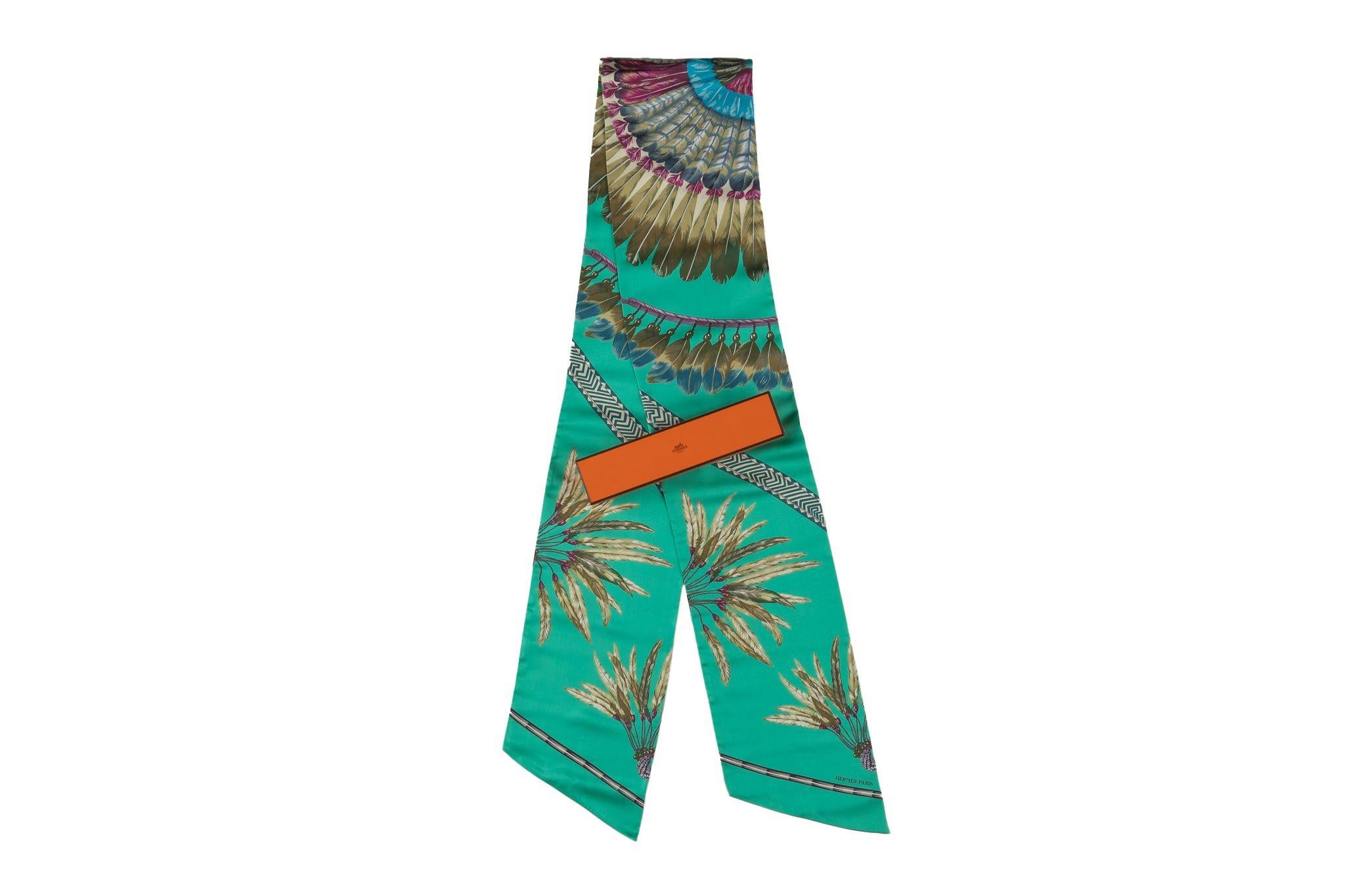 This Hermès teal “Brazil” maxi twilly silk scarf, is a rare limited edition silk twill maxi twilly 