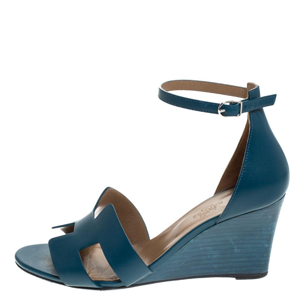 We have our hearts set on these sandals from Hermes. This teal blue pair has been crafted using leather and designed with the signature H on the vamps. They also feature ankle buckle closure and 8cm wedge heels. Take this number out and enjoy both