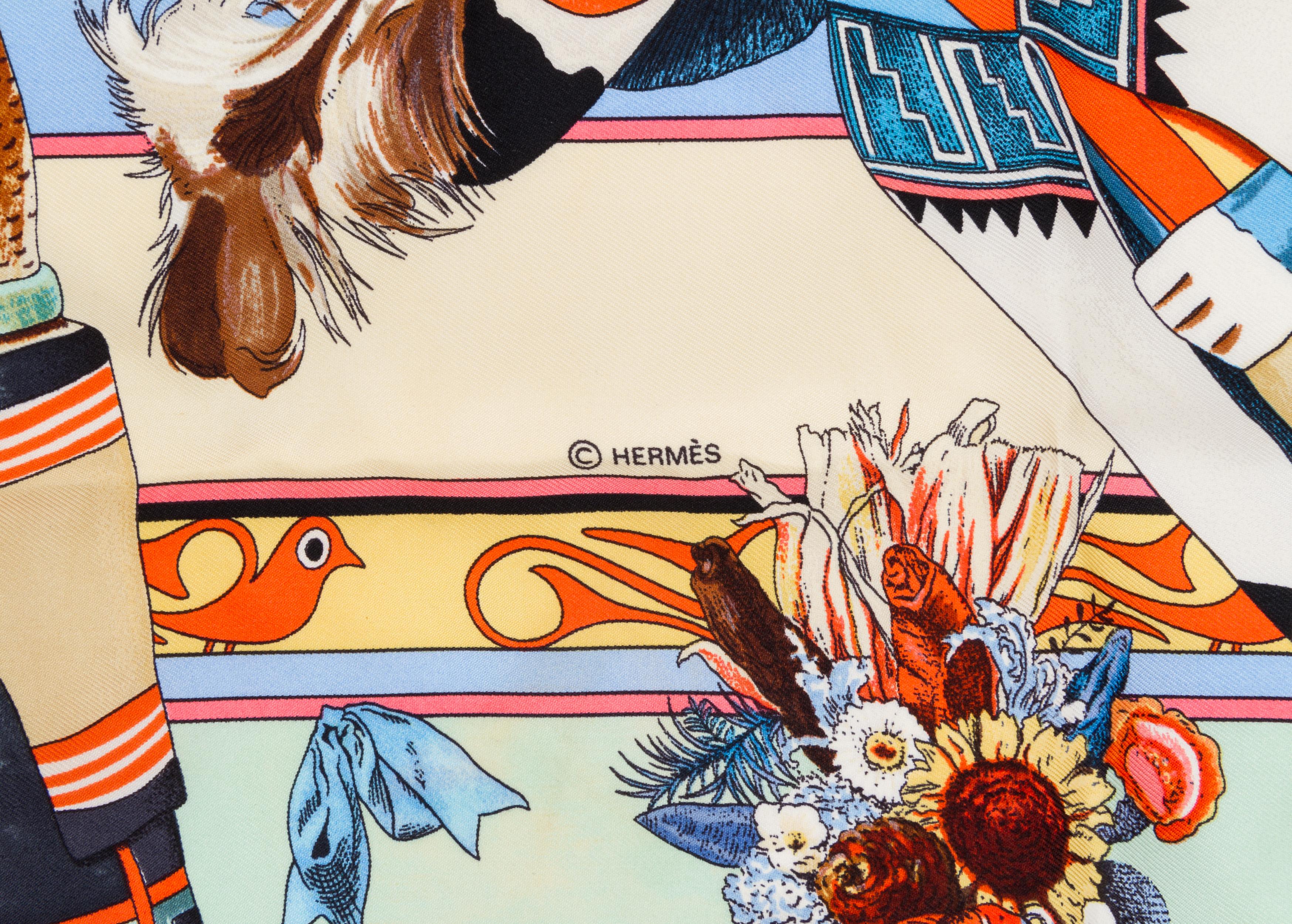Sciarpa Hermès Kachinas disegnata da Kermit Oliver. Bordi arrotolati a mano. Condizioni eccellenti, colorazione da collezione. Etichetta di manutenzione allegata.
