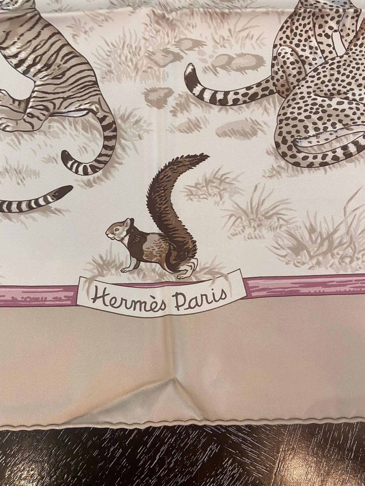 Hermes Tendresse Feline silk twill scarf designed by Robert Dallet. This beautiful scarf was first issued in 2012 and like all of Dallet's previous designs, was an instant hit. Hermes paid homage to this self taught artist on their website. 100%