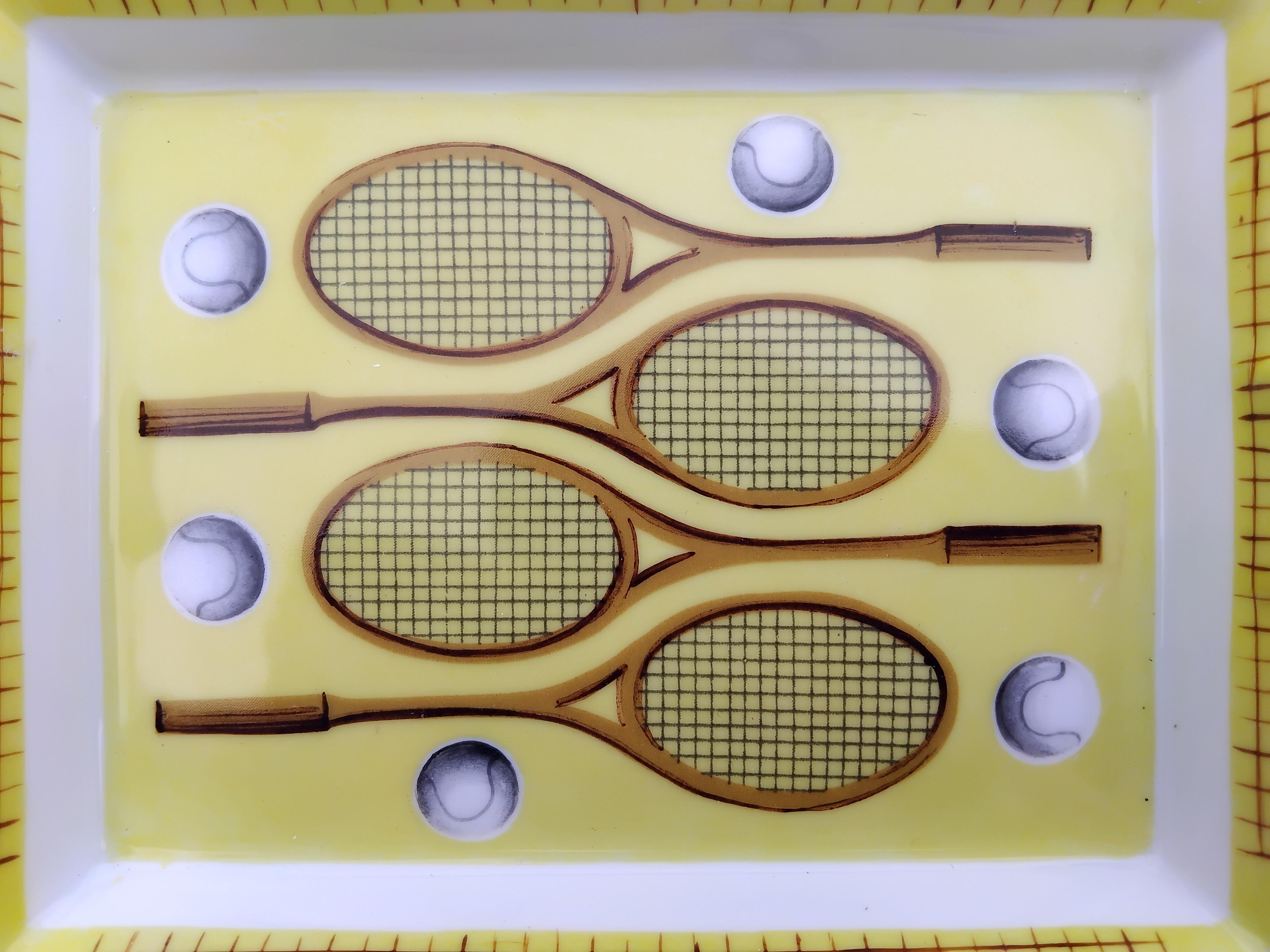 Extremely Rare Authentic Hermès Ashtray

Print: Tennis Racquets, balls, nets

Made in France

Vintage item

Made of porcelain, edges gilded with fine gold

Bottom covered with leather

Colorways: Yellow, White, Brown, Grey

