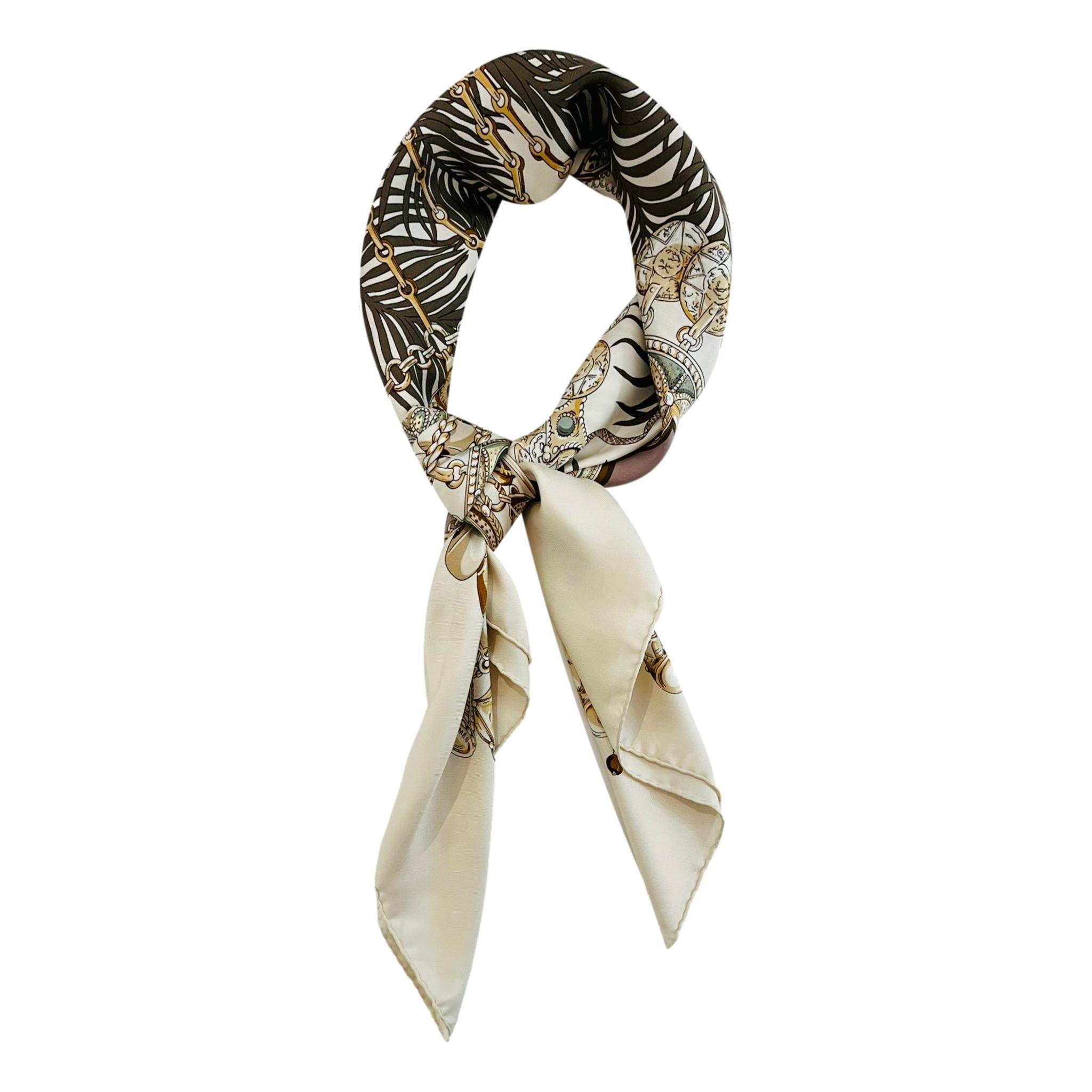 Hermes Terres Precieuses Silk Scarf

Ivory/pearl grey scarf crafted in silk with hand-rolled edges.

Detailed with 'Hermes' and 'Terres Precieuses' inscriptions.

Size – 87/89cm

Condition – Very Good

Composition – 100% Silk

Comes with – Scarf Only