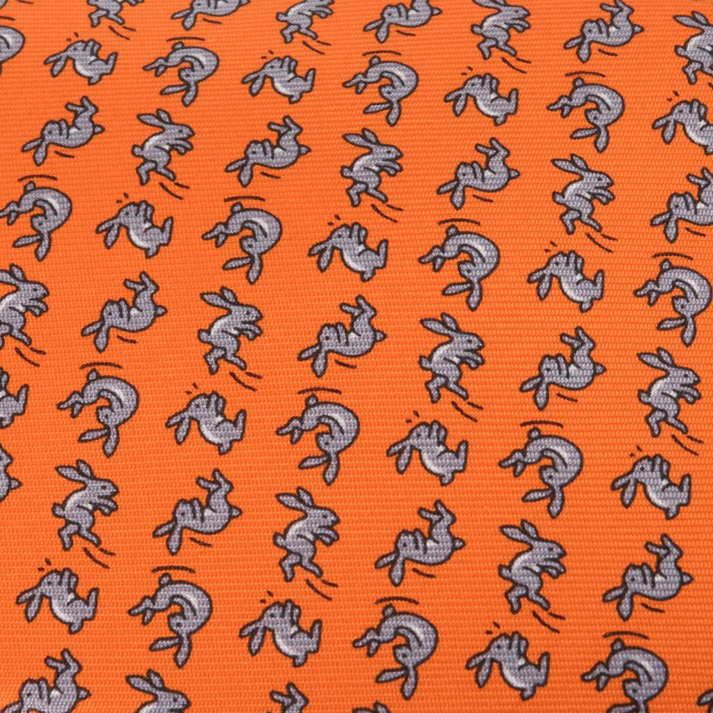 Guaranteed authentic Hermes silk tie features Cabrioles Rabbit in Orange Vif and Gris.
Whimsical and chic this classic piece is a perfect addition to any wardrobe.
NEW or NEVER WORN
Comes with signature Hermes box. 
final sale

TIE MEASURES:
WIDTH